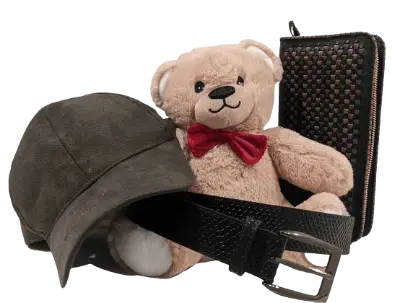 Other used goods including second hand accessories, toys, belts, wallets, and hats